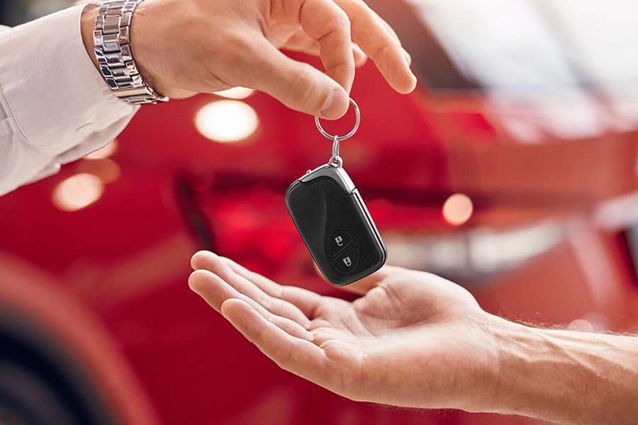 person trading in for new keys